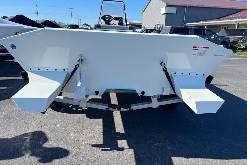 Slide: The Image of 2026 Crestliner 1870 Retriever FCC boat rear view in parking lot. - 2