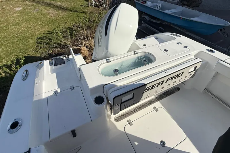 Slide: The Image of 2022 Sea Pro 239 Center Console boat with spacious deck and modern features. - 13