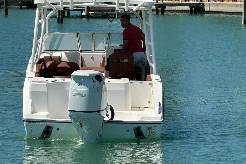 Slide: The Image of 2019 Century 24 Resorter boat with Suzuki 350 engine on clear water. - 10