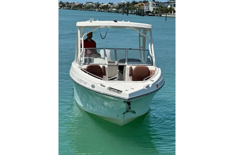 Slide: The Image of 2019 Century 24 Resorter boat cruising on clear blue water. - 18