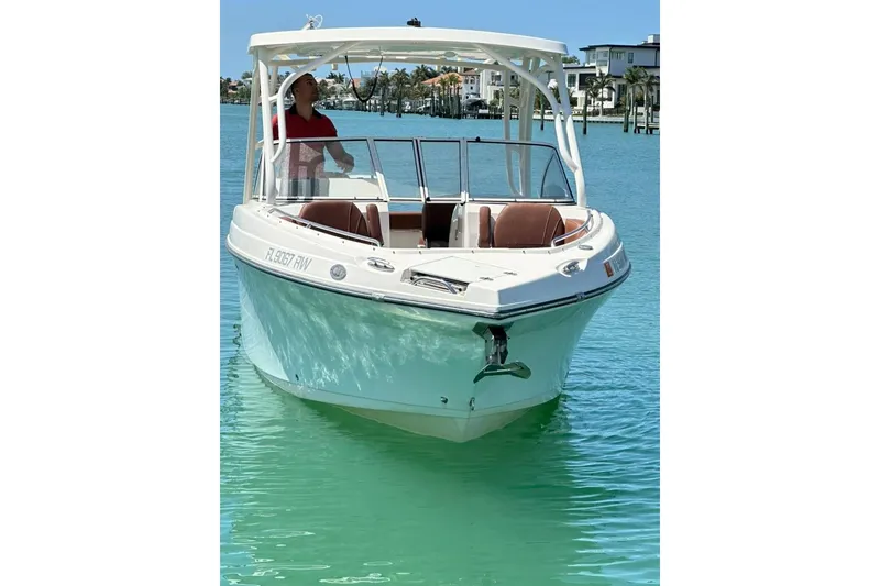 Slide: The Image of 2019 Century 24 Resorter boat on clear turquoise water, sunny day. - 19