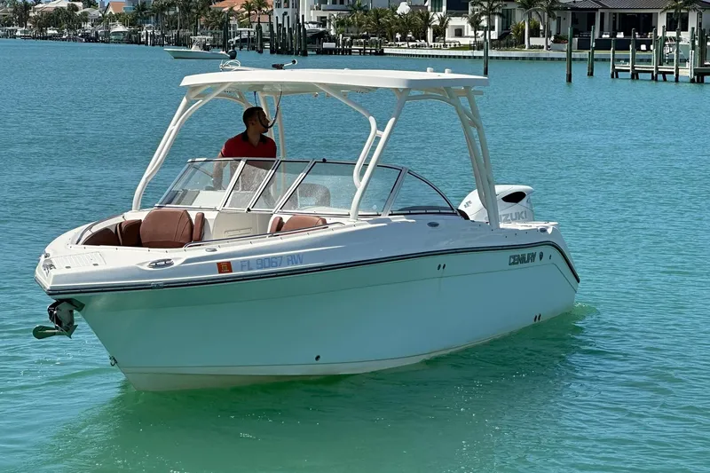 Slide: The Image of 2019 Century 24 Resorter boat cruising in clear turquoise waters. - 3