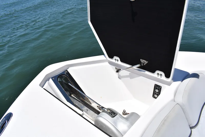 Slide: The Image of 2020 Sea Fox 288 Commander anchor compartment open on calm water. - 15