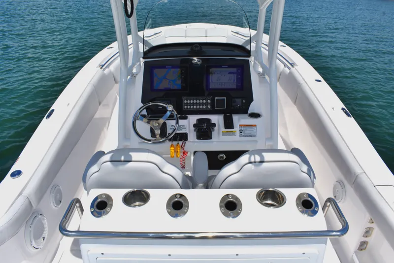 Slide: The Image of 2020 Sea Fox 288 Commander boat cockpit with dual screens and steering wheel. - 20