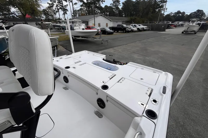 Slide: The Image of 2026 Tidewater 2500 Carolina Bay boat on a parking lot. - 3