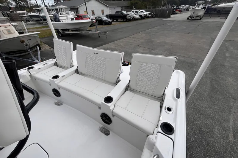 Slide: The Image of 2026 Tidewater 2500 Carolina Bay boat with white seating. - 4