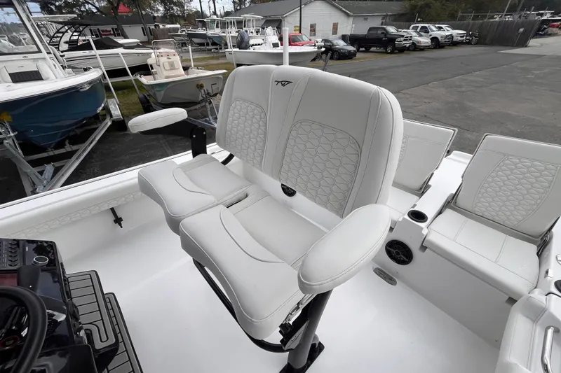 Slide: The Image of 2026 Tidewater 2500 Carolina Bay boat seats in white leather. - 5