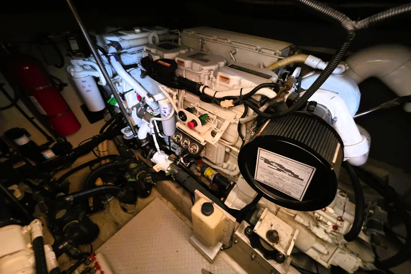 Slide: The Image of Engine room of 1999 Sea Ray Sundancer 540 yacht, showcasing mechanical components. - 15