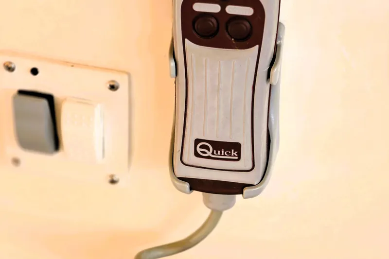 Slide: The Image of Close-up of a Quick brand control panel on a 1999 Sea Ray Sundancer 540 yacht. - 19