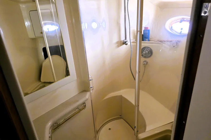 Slide: The Image of Bathroom interior of 1999 Sea Ray Sundancer 540 yacht with shower and mirror. - 27