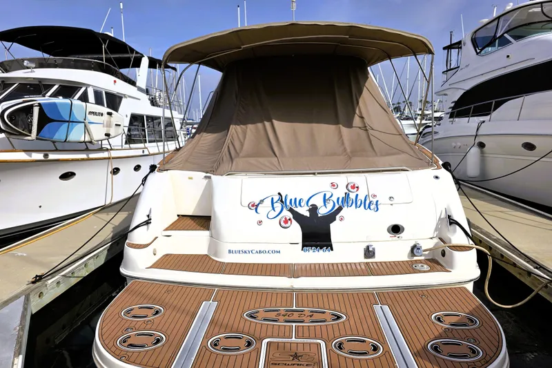 Slide: The Image of 1999 Sea Ray Sundancer 540 yacht named "Blue Bubbles" docked at marina. - 29