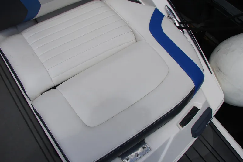 Slide: The Image of White and blue seating on a 2017 Regal 2300 RX Surf boat. - 18