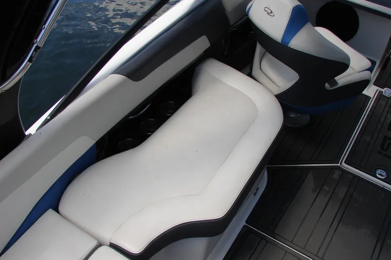 Slide: The Image of Interior seating of a 2017 Regal 2300 RX Surf boat, featuring sleek design and comfortable upholstery. - 19