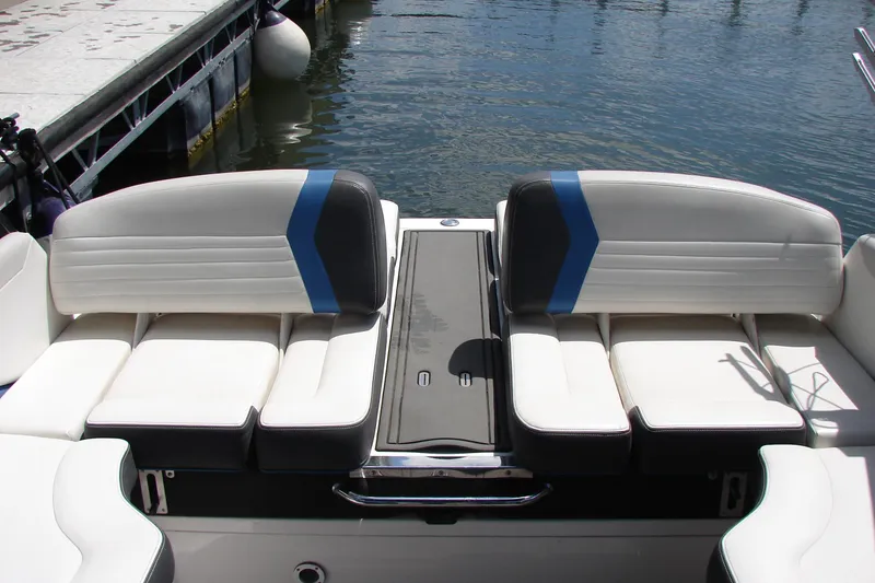 Slide: The Image of 2017 Regal 2300 RX Surf boat interior with stylish seating by the dock. - 27