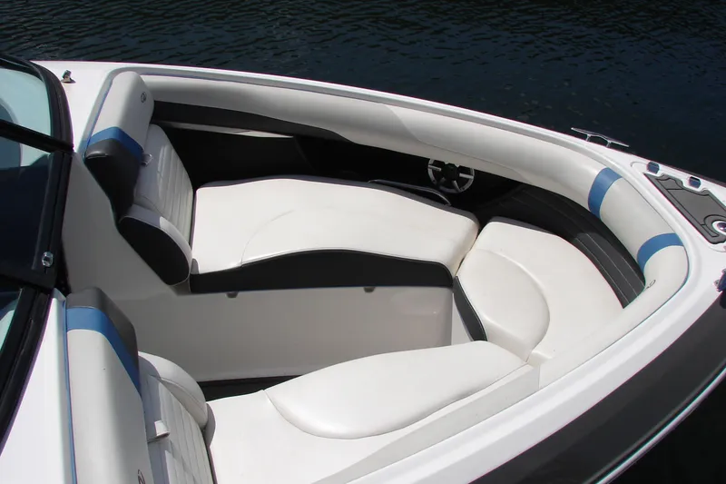 Slide: The Image of 2017 Regal 2300 RX Surf boat interior with white and blue seating. - 6