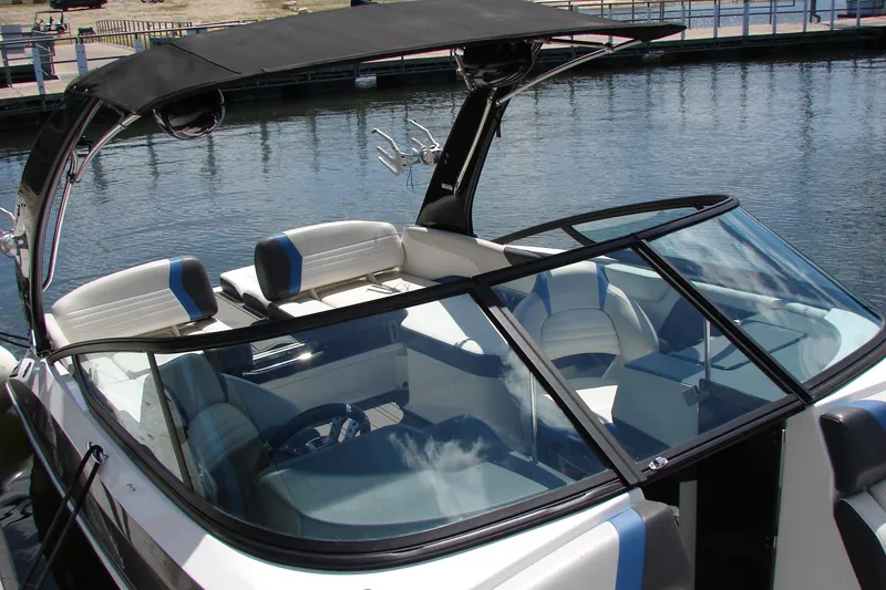 Slide: The Image of 2017 Regal 2300 RX Surf boat with sleek design and spacious seating. - 7