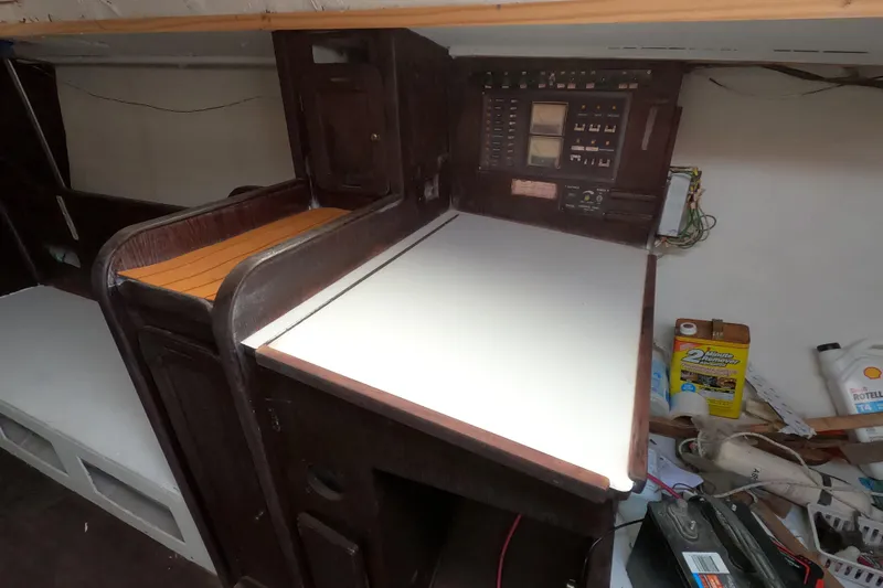 Slide: The Image of 1980 Morgan 382 yacht interior with navigation station and control panel. - 17