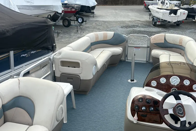 Slide: The Image of 2004 Sun Tracker Party Barge 22 Regency Edition with spacious seating and modern dashboard. - 10