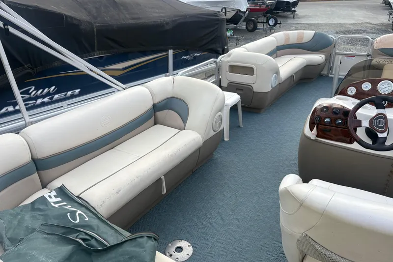 Slide: The Image of 2004 Sun Tracker Party Barge 22 Regency Edition with spacious seating and steering console. - 11