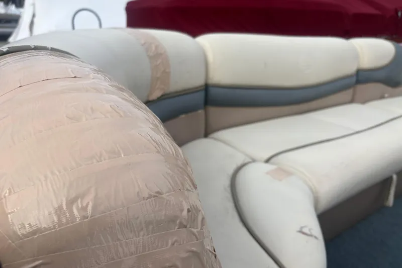 Slide: The Image of 2004 Sun Tracker Party Barge 22 Regency Edition with taped upholstery on seating. - 14