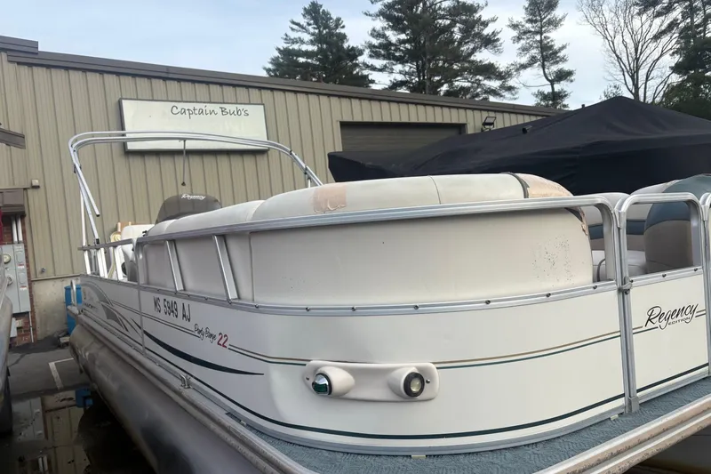 Slide: The Image of 2004 Sun Tracker Party Barge 22 Regency Edition pontoon boat docked near Captain Bub's. - 2