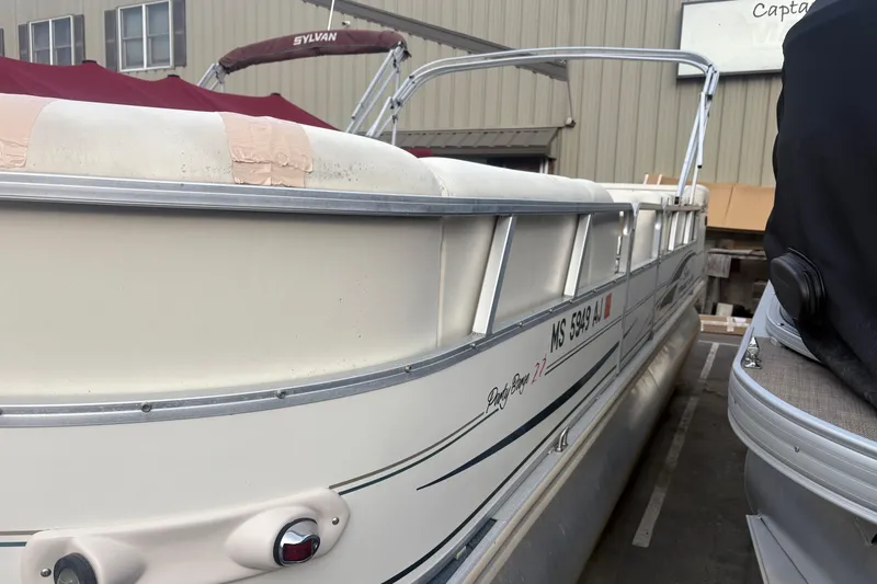 Slide: The Image of 2004 Sun Tracker Party Barge 22 Regency Edition pontoon boat docked outdoors. - 4