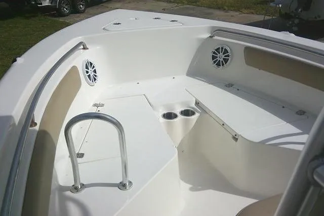 Slide: The Image of 2017 Key West 203 FS boat interior with seating and cup holders. - 17