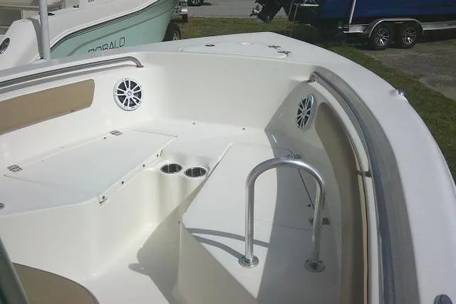 Slide: The Image of 2017 Key West 203 FS boat interior with seating, cup holders, and speakers. - 19