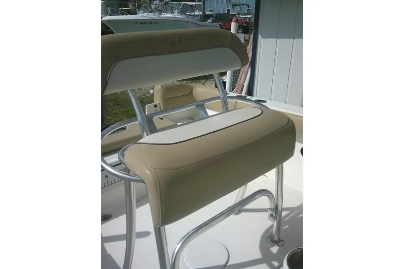 Slide: The Image of 2017 Key West 203 FS boat seat with beige and white upholstery. - 21