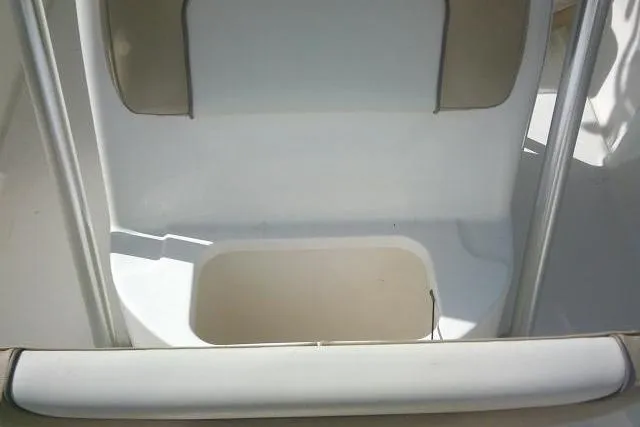 Slide: The Image of 2017 Key West 203 FS boat interior with seating and storage compartment. - 27