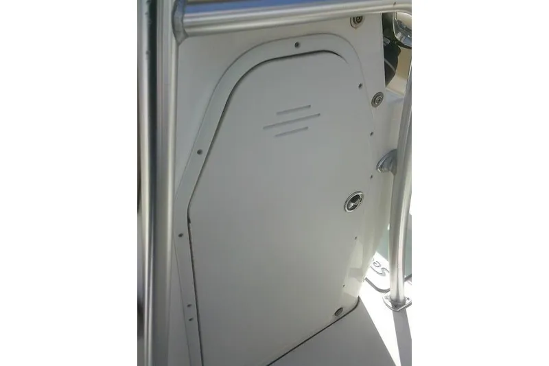 Slide: The Image of 2017 Key West 203 FS boat interior compartment door with metal railing. - 28