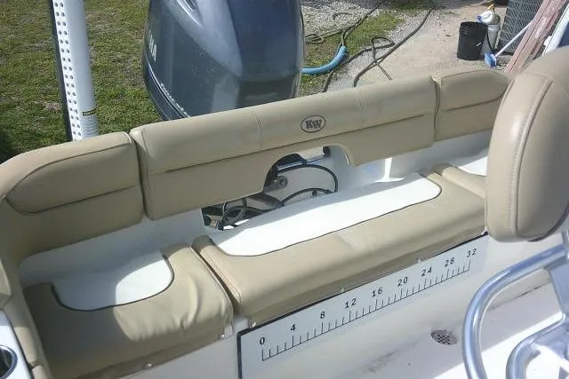 Slide: The Image of 2017 Key West 203 FS boat with beige seating and Yamaha outboard motor. - 36