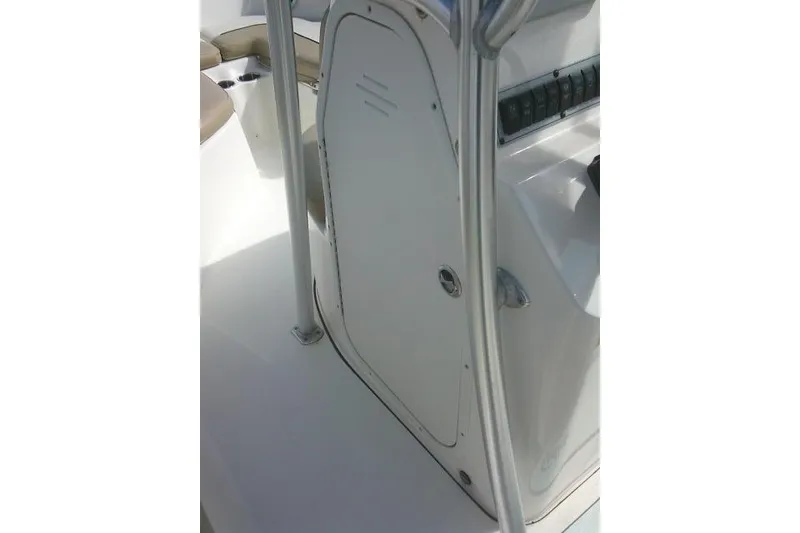 Slide: The Image of 2017 Key West 203 FS boat console with storage compartment and control panel. - 42