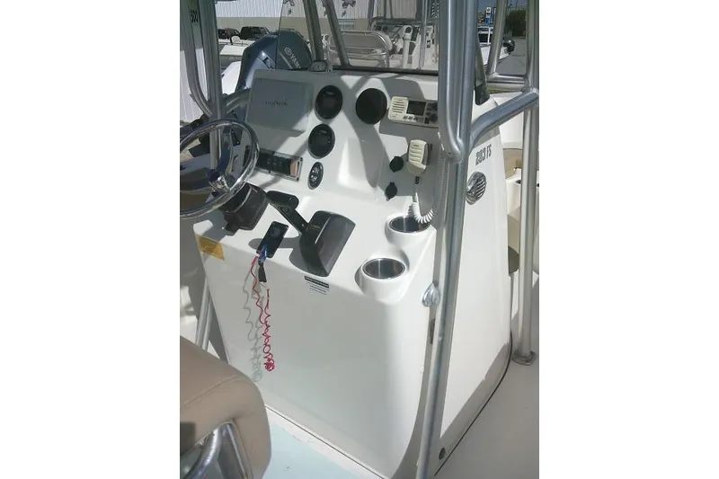 Slide: The Image of 2017 Key West 203 FS boat console with steering wheel and controls. - 47