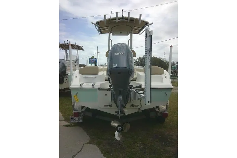 Slide: The Image of 2017 Key West 203 FS boat with 150 HP outboard motor, rear view. - 9
