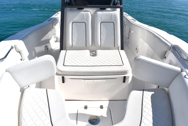 Slide: The Image of 2020 Sea Fox 266 Commander boat interior with white cushioned seating. - 10