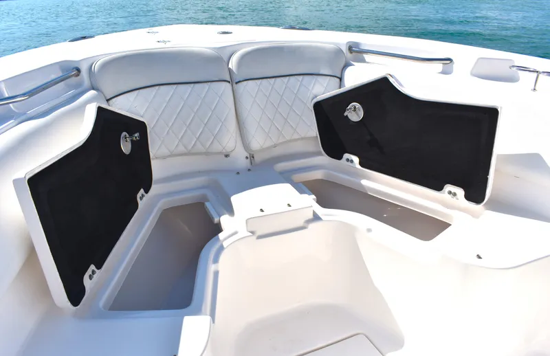 Slide: The Image of 2020 Sea Fox 266 Commander boat interior with storage compartments and cushioned seating. - 11