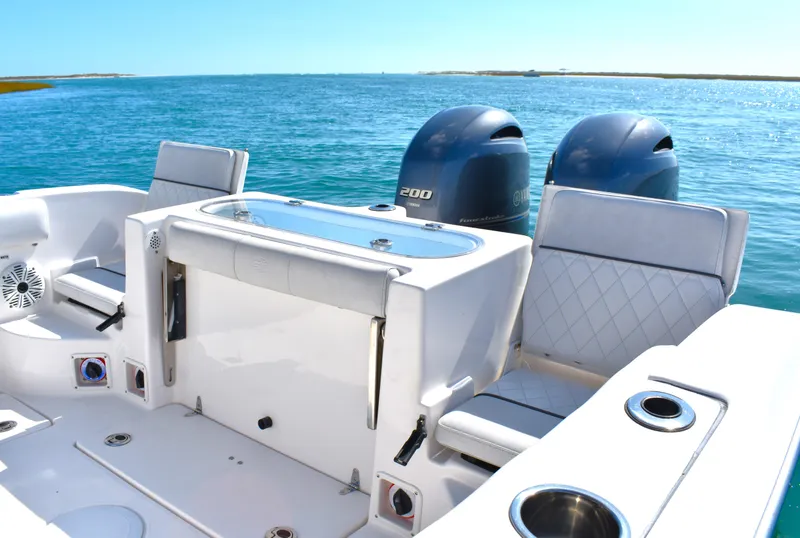 Slide: The Image of 2020 Sea Fox 266 Commander boat with dual engines on open water. - 12