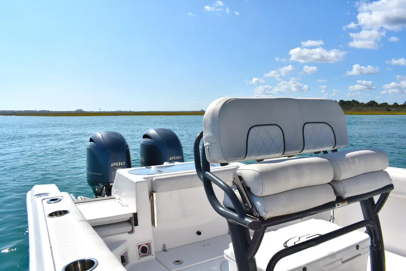 Slide: The Image of 2020 Sea Fox 266 Commander boat with dual engines on a sunny day. - 16