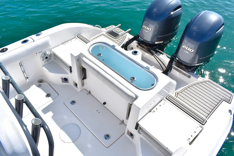 Slide: The Image of 2020 Sea Fox 266 Commander boat deck with dual engines and livewell. - 18