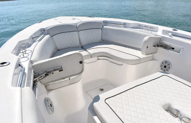 Slide: The Image of Luxurious seating area on 2020 Sea Fox 266 Commander boat, with ocean backdrop. - 9