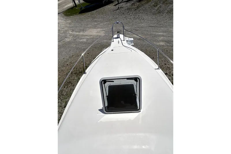Slide: The Image of 1995 Sea Ray 250 Sundancer boat deck with open hatch, viewed from above. - 21