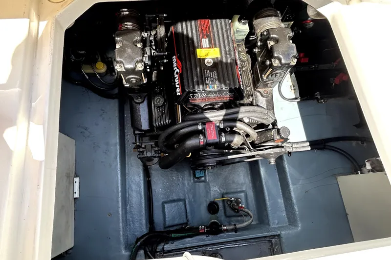 Slide: The Image of Engine compartment of a 1995 Sea Ray 250 Sundancer with MerCruiser 5.7L Alpha One. - 35
