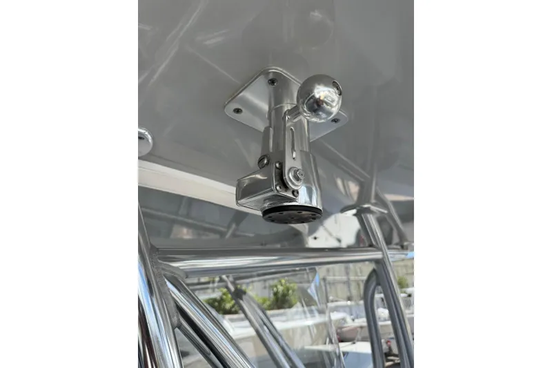 Slide: The Image of Chrome fixture on 2020 Contender 35 ST boat, mounted on overhead structure. - 12