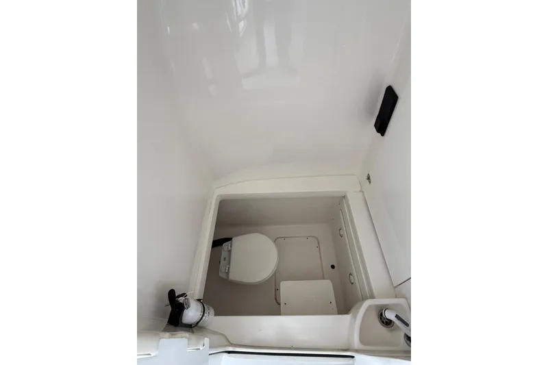 Slide: The Image of 2020 Contender 35 ST boat interior with compact marine toilet. - 14
