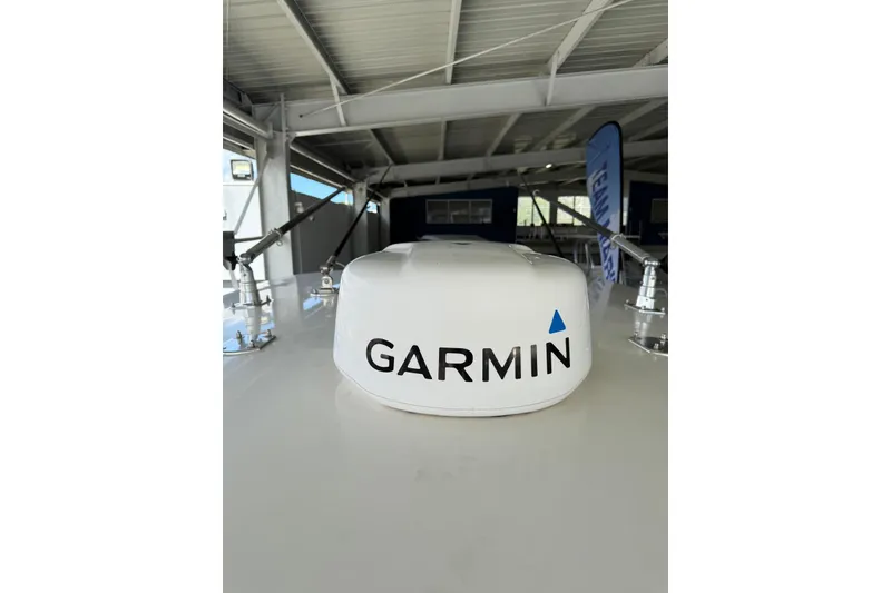 Slide: The Image of Garmin radar on 2020 Contender 35 ST boat under a covered dock. - 15