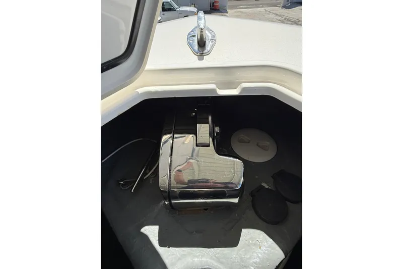 Slide: The Image of 2020 Contender 35 ST boat anchor compartment with chrome hardware. - 19