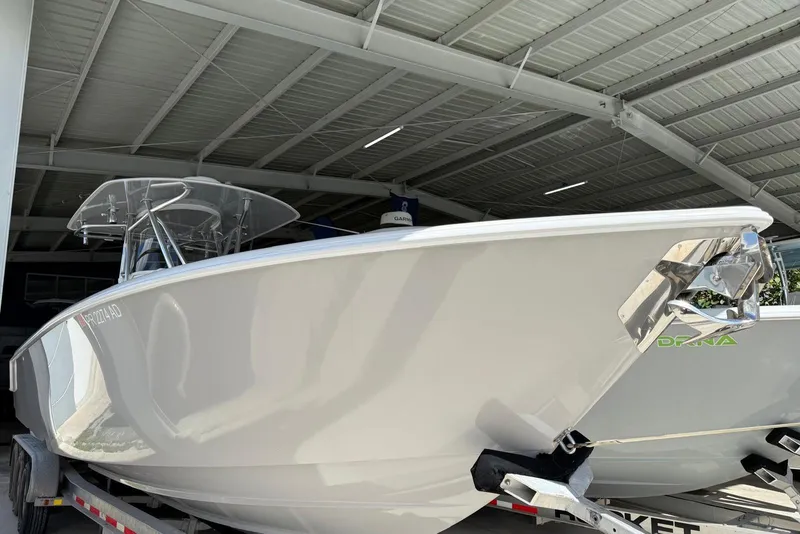 Slide: The Image of 2020 Contender 35 ST boat in storage, showcasing sleek design and modern features. - 3