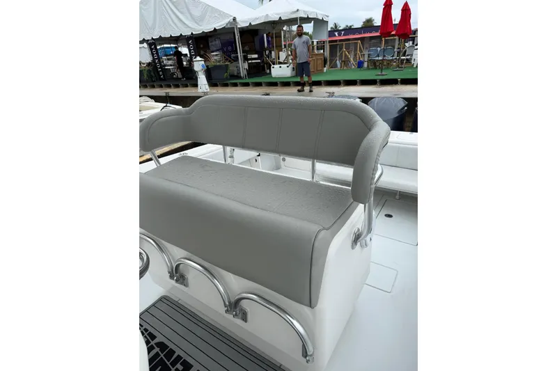 Slide: The Image of 2020 Contender 35 ST boat with gray seating, dockside view. - 7