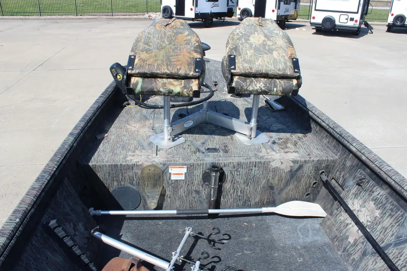 Slide: The Image of 2014 Lowe Roughneck 1756 boat with camouflage seats and fishing gear. - 10